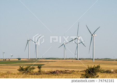 Wind turbines in an arid landscape. An alternative way of generating electricity 74742181