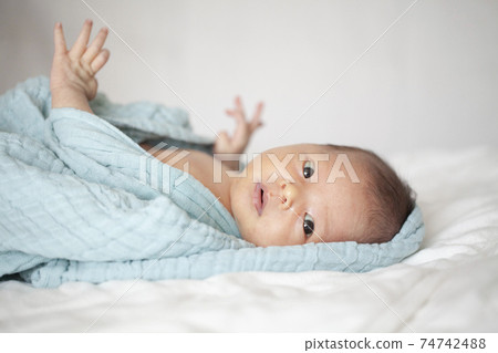 Newborn baby girl 74742488