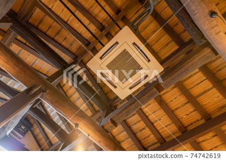 Ceiling air conditioner in an old folk house 74742619