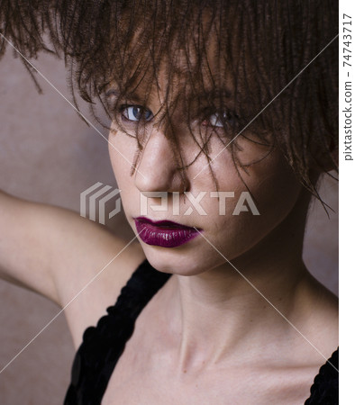beauty blond woman in studio on black background, stylish fashion retro vintage copyspace close up 74743717