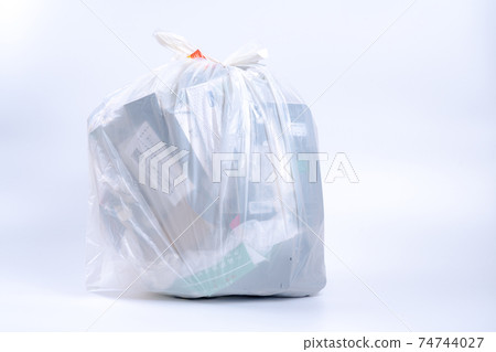 Shopping bag packed with garbage Shopping bag packed with garbage 74744027