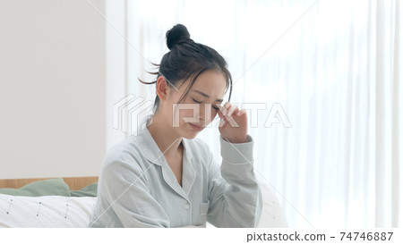 Tired woman lacks sleep Tired woman lacks sleep 74746887