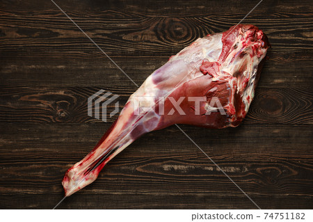 Overhead view of raw deer leg 74751182