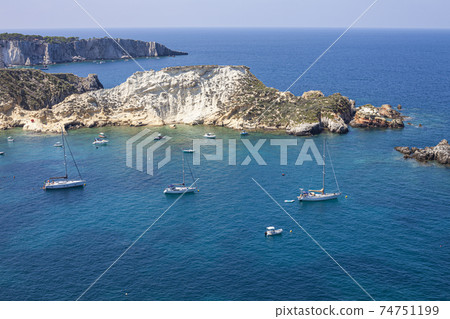 View of the Tremiti Islands. San Domino island, Italy: scenic view of tipycal rocky coastline. View of the Tremiti Islands. San Domino island, Italy: scenic view of tipycal rocky coastline. 74751199