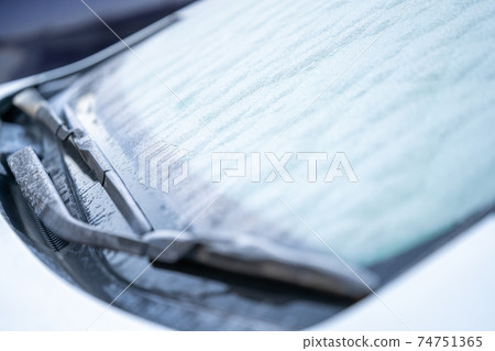 Frost on the windshield of a car Frost on the windshield of a car 74751365