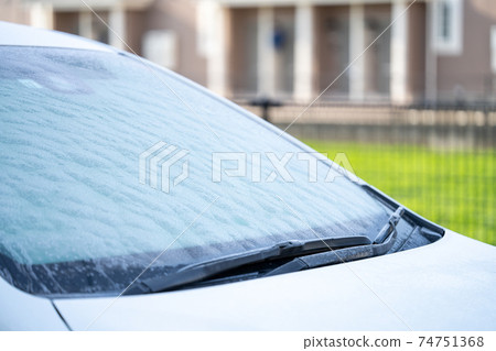 Frost on the windshield of a car Frost on the windshield of a car 74751368