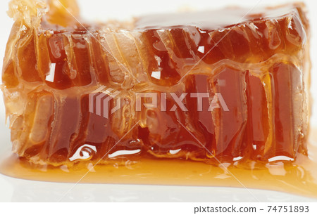 Piece of gold color honey Piece of gold color honey 74751893