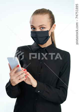 Woman in mask wearing mask 74751895