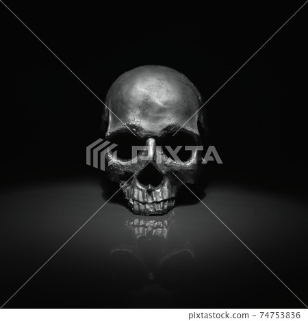 Spooky dark black skull aginast dark background Spooky dark black skull aginast dark background 74753836