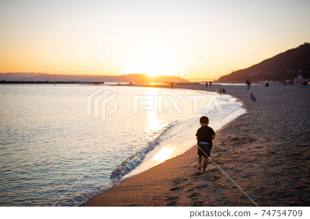 The coast dyed in blue and orange 74754709