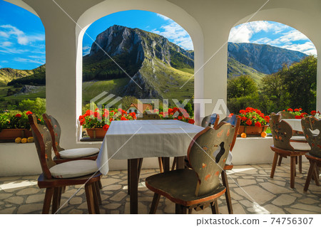 Beautiful view with Piatra Secuiului from the balcony, Rimetea, Romania Beautiful view with Piatra Secuiului from the balcony, Rimetea, Romania 74756307