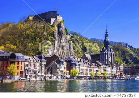 pictorial Dinant over river Meuse in Belgium 74757057