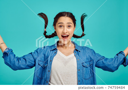 Funny surprised woman, positive emotion Funny surprised woman, positive emotion 74759484