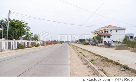 A rugged driveway in the suburbs of Vientiane, Laos 74759560