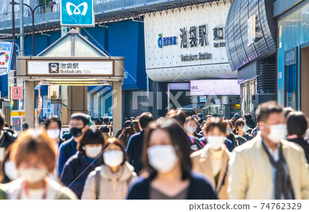 Tokyo cityscape of Japan in front of Ikebukuro station under the state of emergency. Threat crowd. It's no different from normal times ... = February 20 74762329