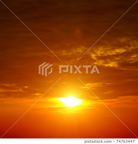 Bright red sky and sunrise. 74763447