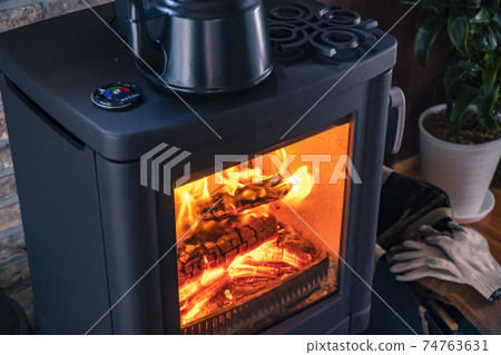 Room with wood stove 74763631