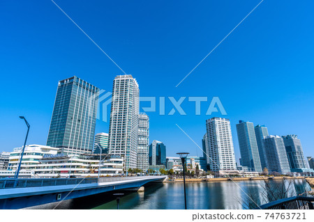 Yokohama cityscape of Japan View of Minatomirai Bridge and Yokohama Bay Quarter that shines in the blue sky 74763721