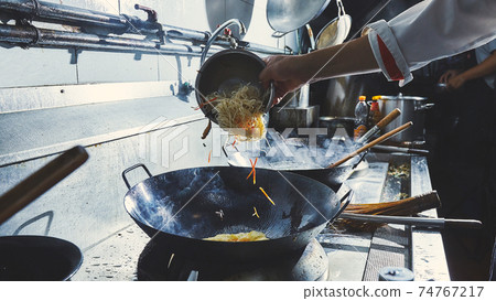 Chef stir fry cooking Chef stir fry cooking 74767217