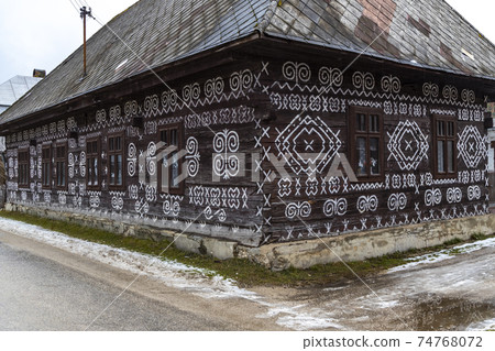 Painted folk house, UNESCO village Cicmany in Slovakia 74768072