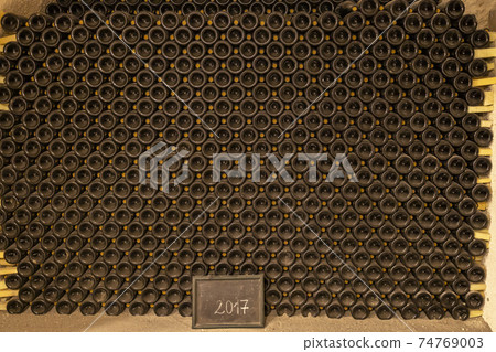 bottles of wine in old cellar in center of Eger, Northern Hungary bottles of wine in old cellar in center of Eger, Northern Hungary 74769003