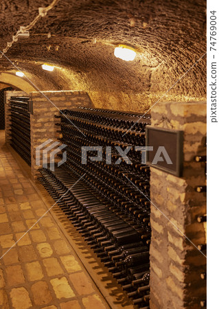 bottles of wine in  old cellar in center of Eger, Northern Hungary 74769004
