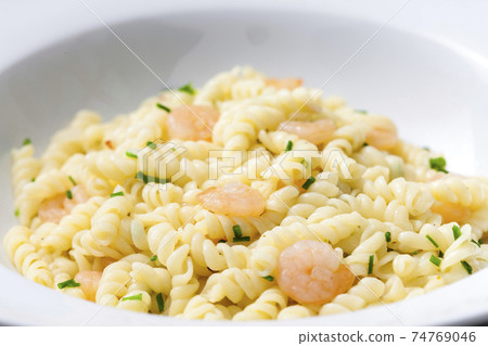 fusilli pasta with prawns and chive fusilli pasta with prawns and chive 74769046