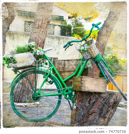 charming street decoration with old bikes 74770738