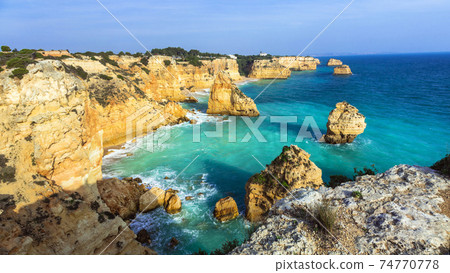 Praia da Marinha  - impressive beach with rocks in Algarve, Portugal 74770778