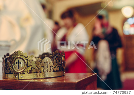 wedding ceremony in the registry office, close-up rings, vows of brides and dressing rings. 74770927