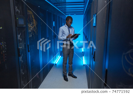 African American Man in Data Center 74771592