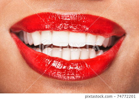 Close up shot of sexy red lips of woman 74772201