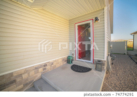 Glass entrance door to a timber house 74774291