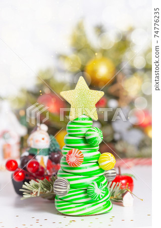 Caramel candy Christmas tree. Christmas card concept. Caramel candy Christmas tree. Christmas card concept. 74776235