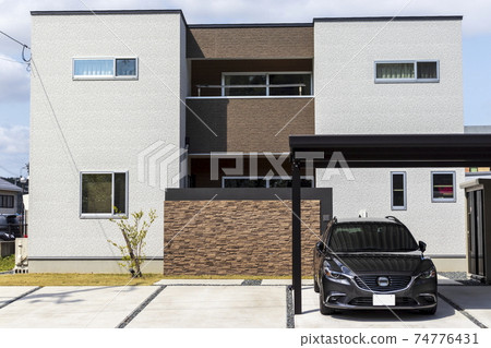 Houses and cars with carports 74776431