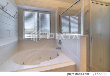 Bathroom interior with spa bath or jacuzzi Bathroom interior with spa bath or jacuzzi 74777169