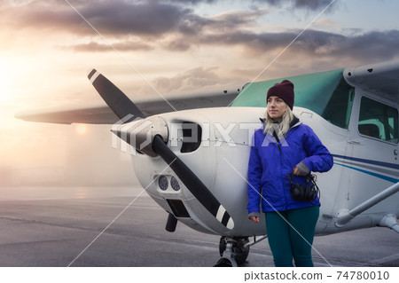 Young Caucasian Girl Student Pilot Young Caucasian Girl Student Pilot 74780010