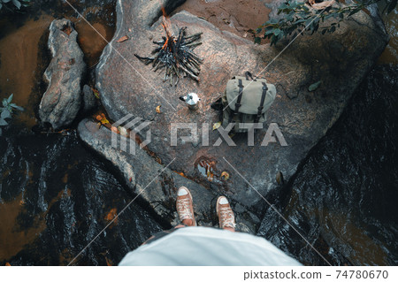 Outdoor at a waterfall in a tropical rainforest Outdoor at a waterfall in a tropical rainforest 74780670