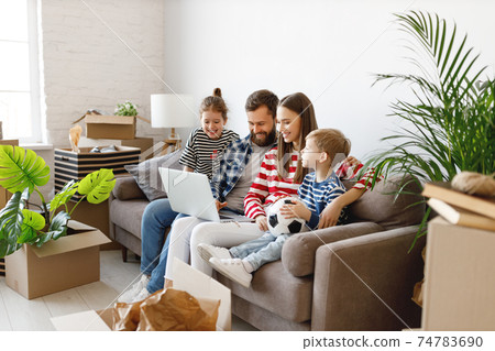 Cheerful family buying new flat online 74783690