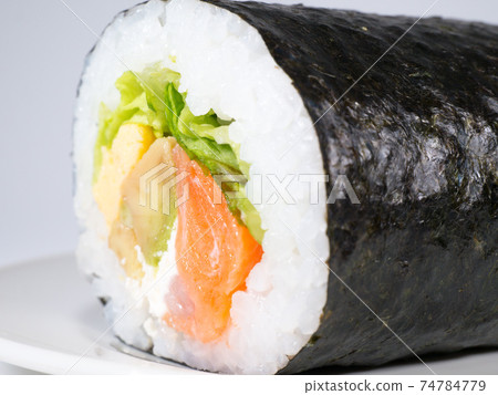 Avocado and salmon sushi rolls Avocado and salmon sushi rolls 74784779