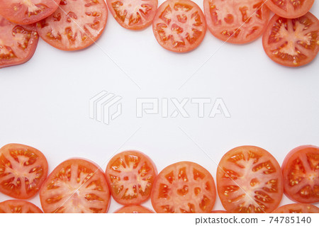 Tomato slices from a bird's-eye view Tomato slices from a bird's-eye view 74785140