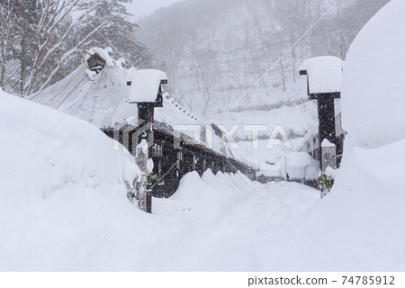 Tsuru no Yu Onsen in the snowy landscape 74785912
