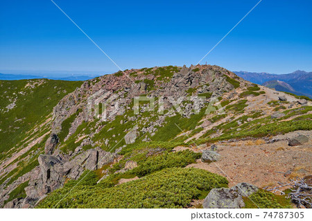 View toward the summit of Mt. Mao from the Mao Garden near the Norikura summit (Tatamidaira) bus terminal in Takayama City, Gifu Prefecture 74787305