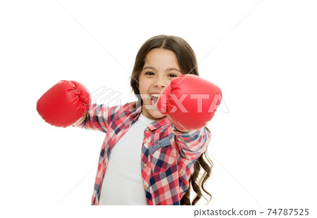 Girl power and feminism concept. Happy kid boxing  74787525