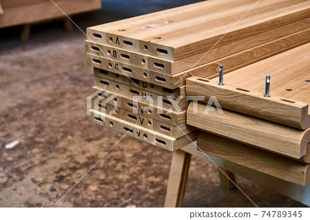 Wooden elements for double bed closeup. Furniture manufacture Wooden elements for double bed closeup. Furniture manufacture 74789345
