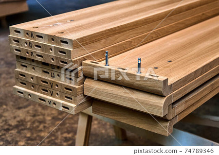 Wooden elements for double bed closeup. Furniture manufacture Wooden elements for double bed closeup. Furniture manufacture 74789346
