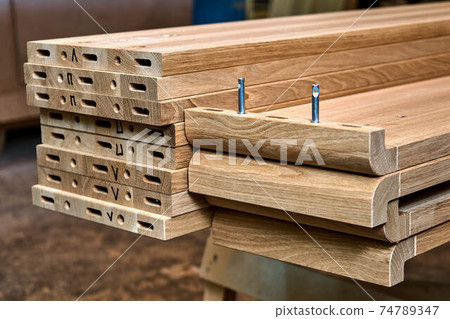 Wooden elements for double bed closeup. Furniture manufacture Wooden elements for double bed closeup. Furniture manufacture 74789347