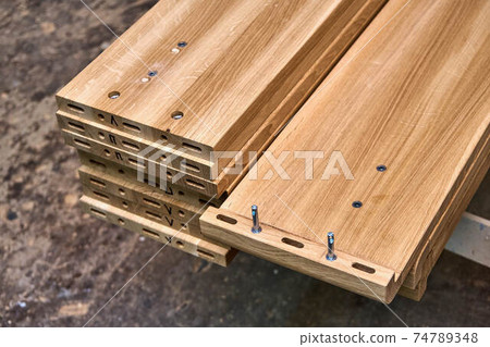 Wooden elements for double bed closeup. Furniture manufacture Wooden elements for double bed closeup. Furniture manufacture 74789348
