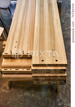 Wooden elements for double bed closeup. Furniture manufacture Wooden elements for double bed closeup. Furniture manufacture 74789349