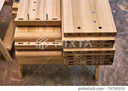 Wooden elements for double bed closeup. Furniture manufacture Wooden elements for double bed closeup. Furniture manufacture 74789350